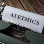 Máquina de escribir con la palabra Ethics - regulación AI Act España 2026